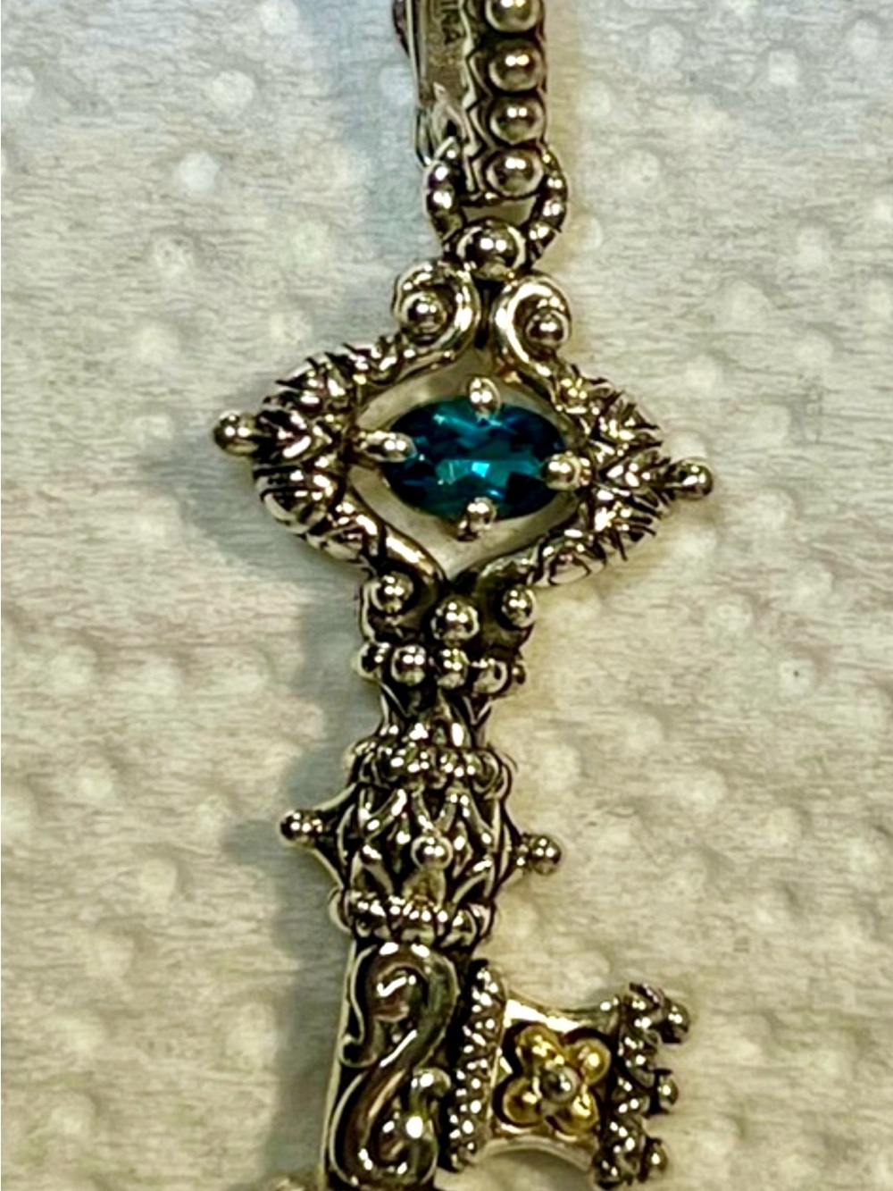 Beautiful Key enhancer/pendant by Barbara Bixby, with blue topaz. 18k 925 China